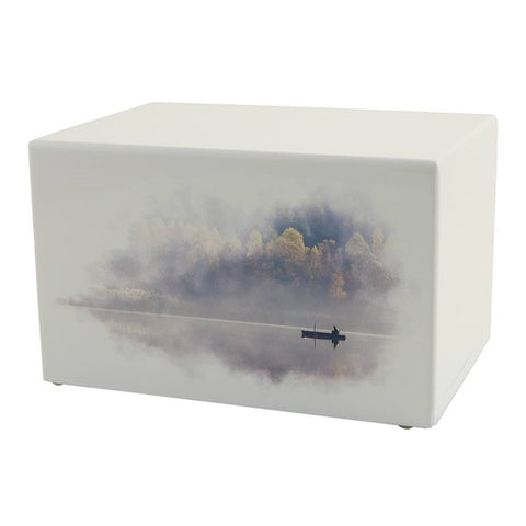 low cost nautical cremation urn | boat in calm waters | Vision Medical